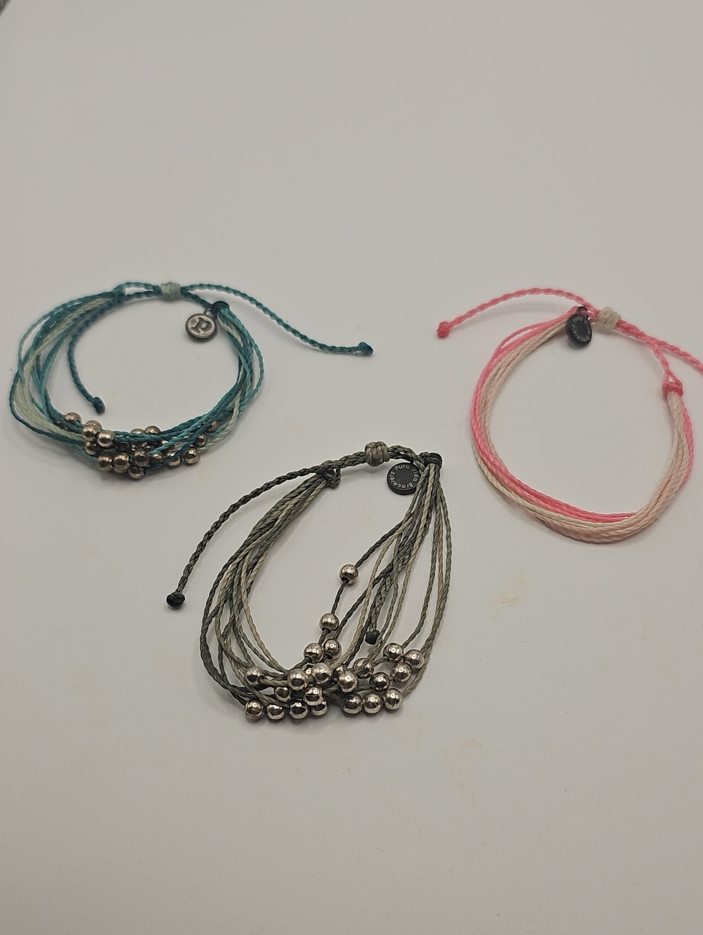 This Is A Lot Of 3 Pura Vida Boho Braclets. New..